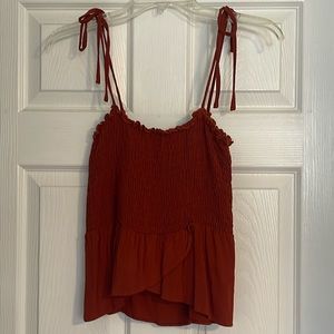 Burnt red color top size small